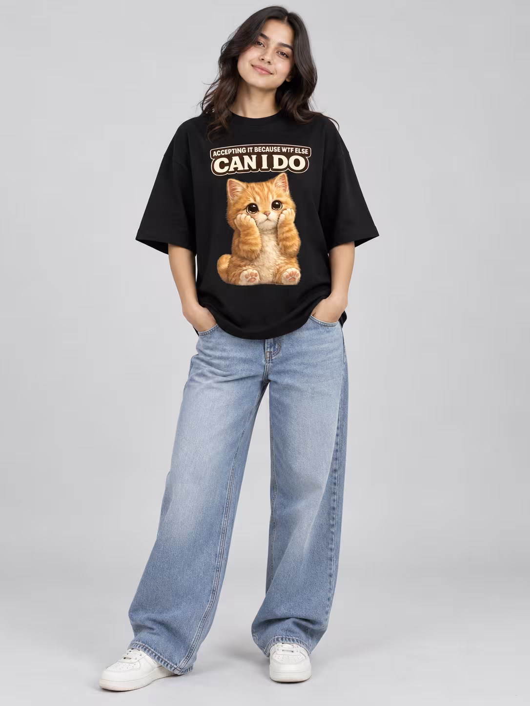 Accepting Fate Cat Unisex Terry Oversized Tee in Black, worn by a model