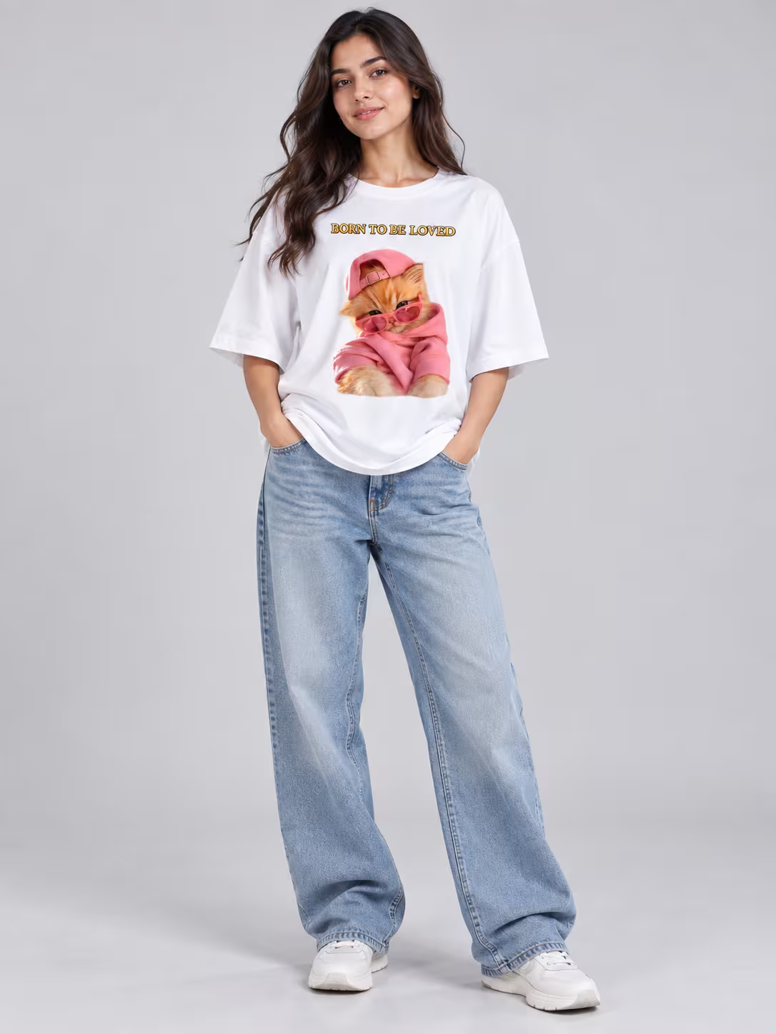 Born To Be Loved Unisex Oversized T-Shirt in White, worn by a model