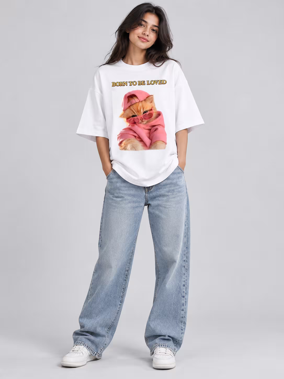 Born To Be Loved Unisex Terry Oversized Tee in White, worn by a model