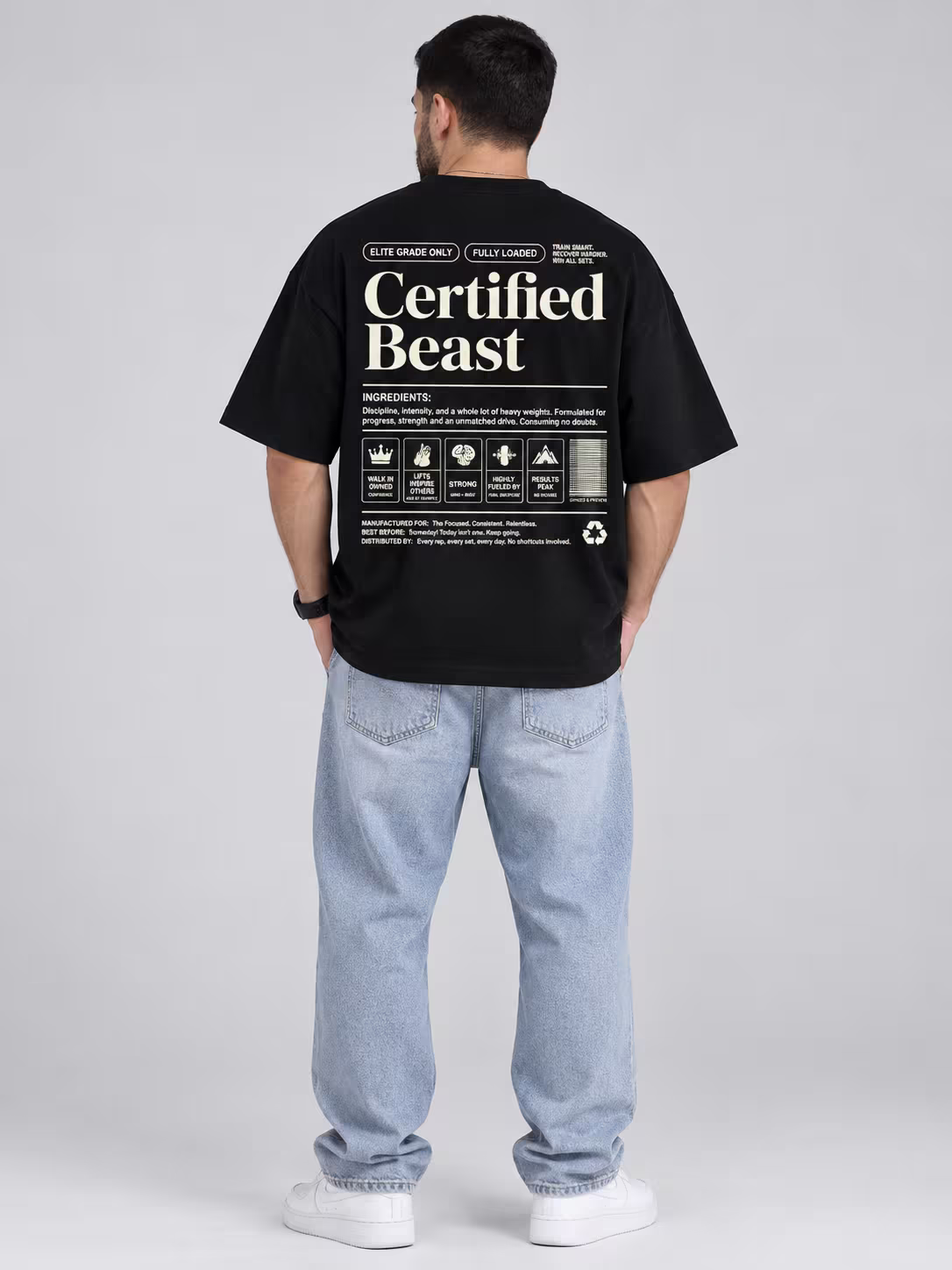 Certified Beast Black Unisex Terry Oversized Tee in Black, back print, worn by a model