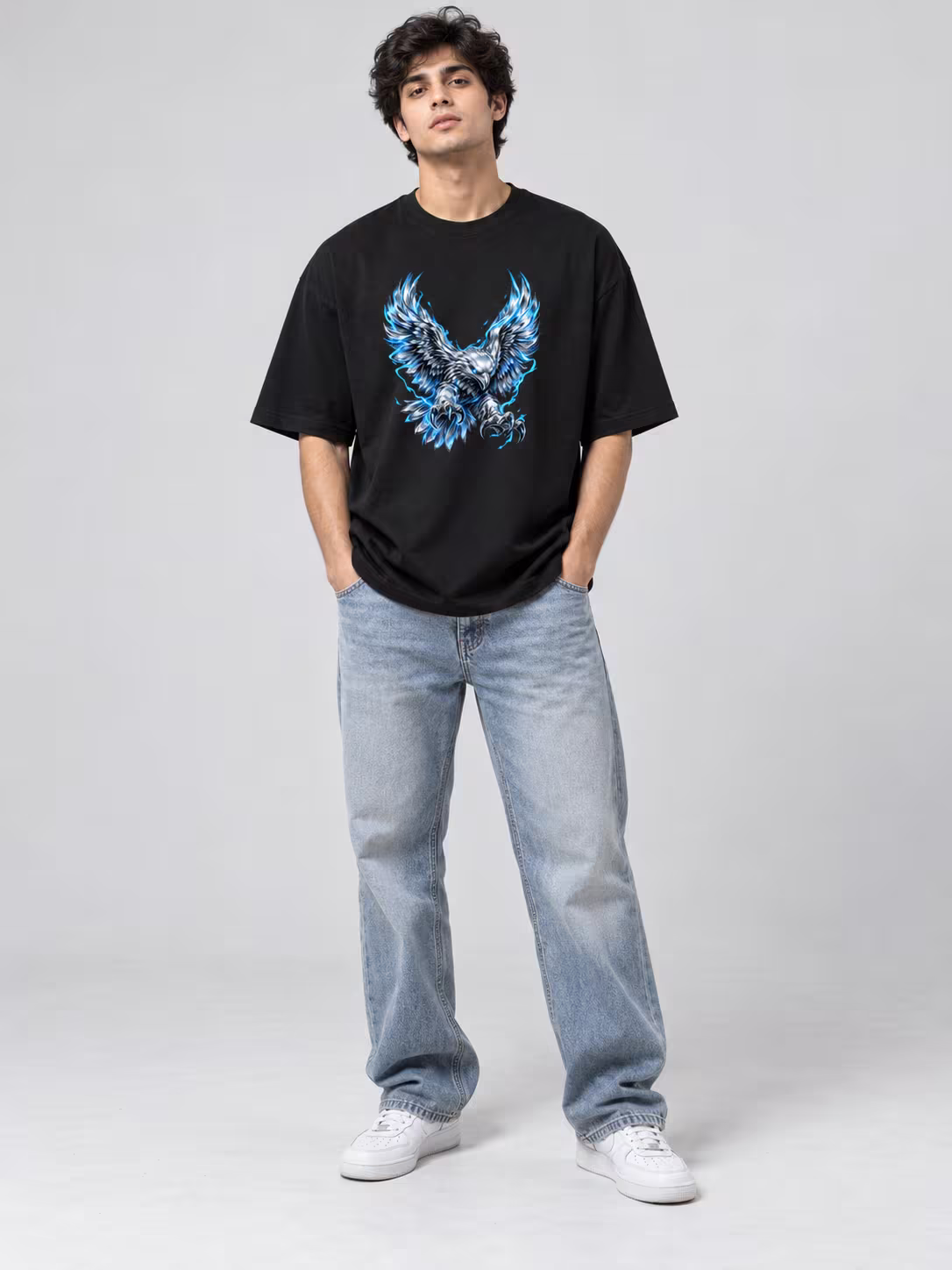Eagle t-shirt: Chrome Eagle Unisex Oversized T-Shirt in Black, worn by a model