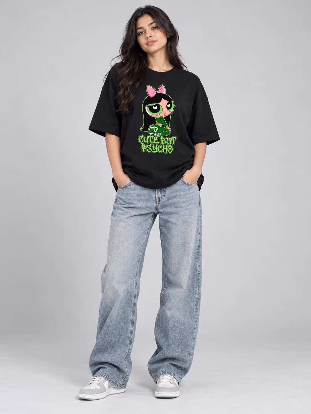 Cute But Psycho Unisex Oversized T-Shirt in Black, worn by a model