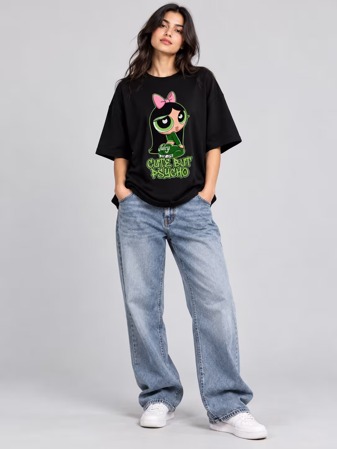 Cute But Psycho Unisex Terry Oversized Tee in Black, worn by a model