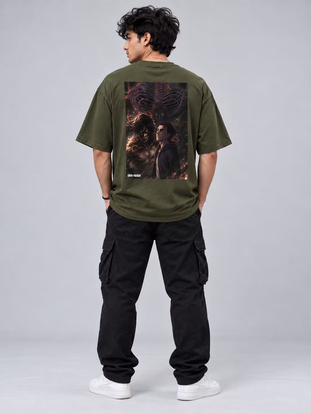 Eren Yaeger Unisex Oversized T-Shirt in Olive Green, back print, worn by a model