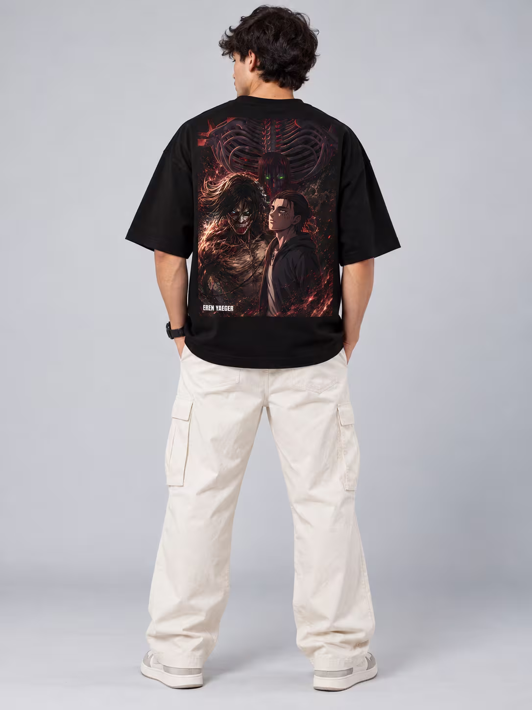 Eren Yaeger Unisex Terry Oversized Tee in Black, back print, worn by a model