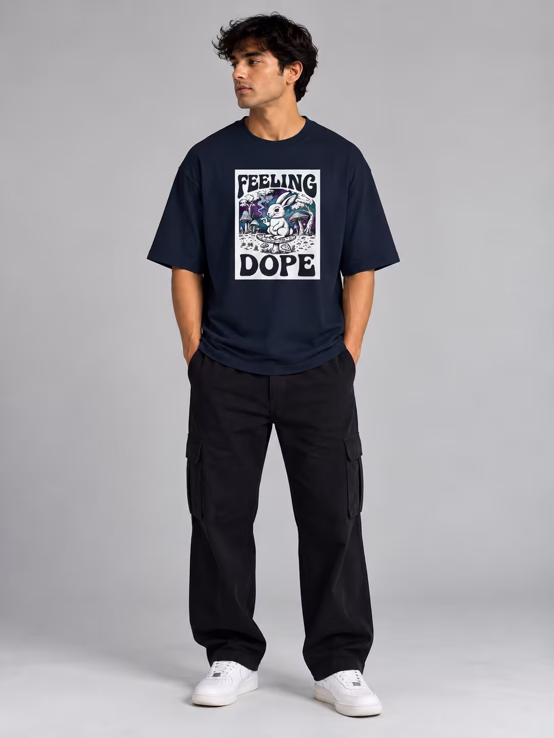 Feeling Dope Unisex Terry Oversized Tee in Navy Blue, worn by a model