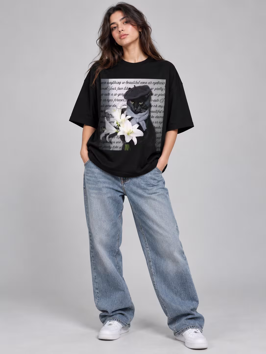 Flower Cat Unisex Oversized T-Shirt in Black, worn by a model