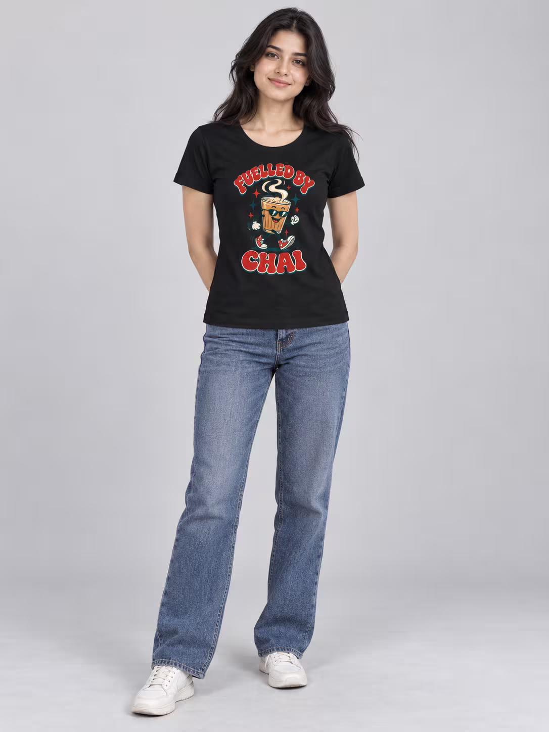 Fuelled By Chai Women's T-Shirt in Black, worn by a model