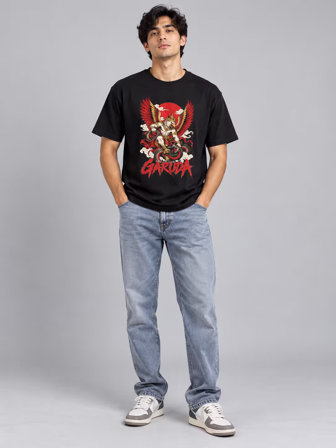 Garuda Regular Fit T-Shirt in Black, worn by a model