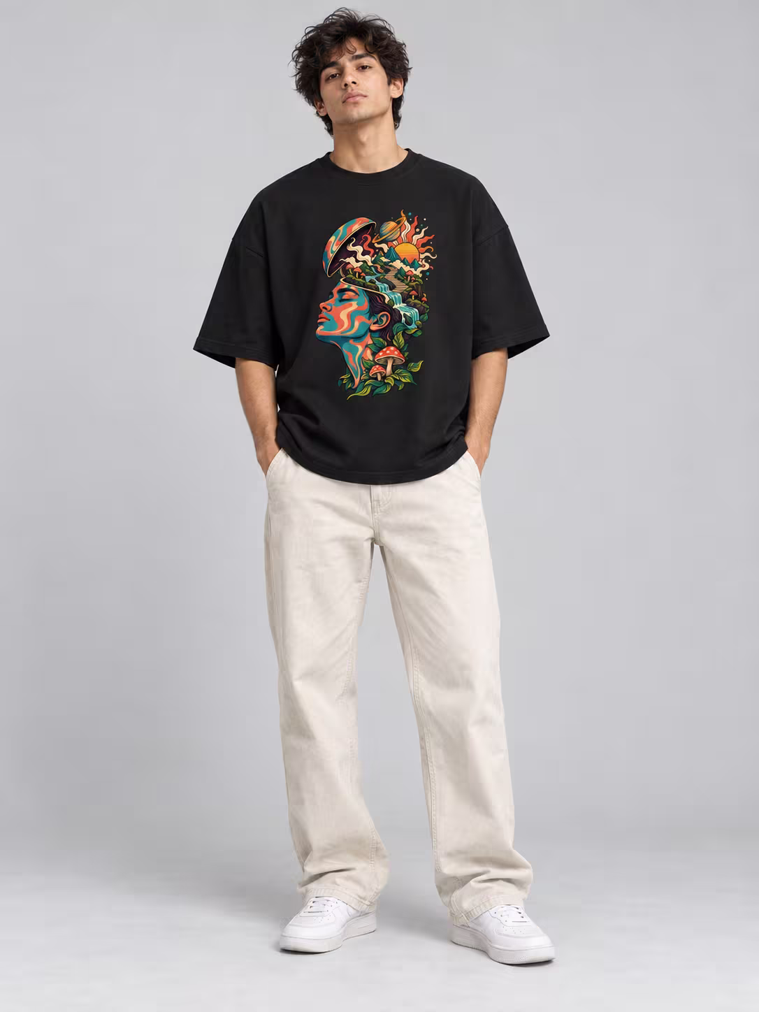 Inner Space Unisex Terry Oversized Tee in Black, worn by a model
