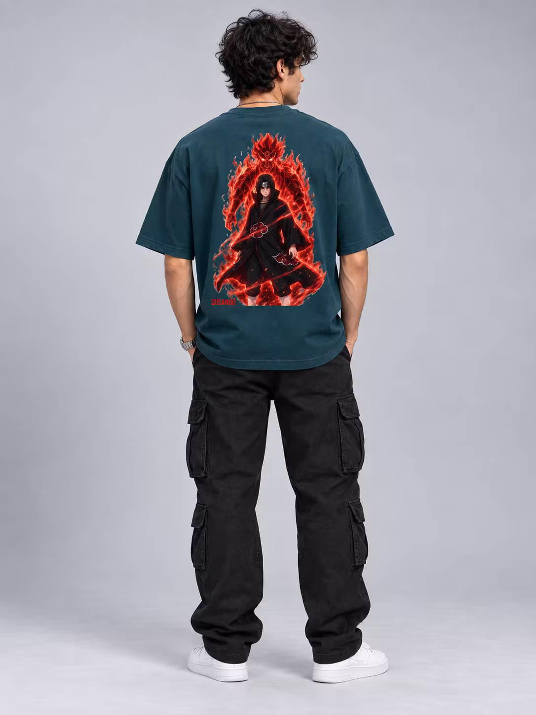 Itachi Uchiha Unisex Oversized T-Shirt in Petrol Blue, back print, worn by a model