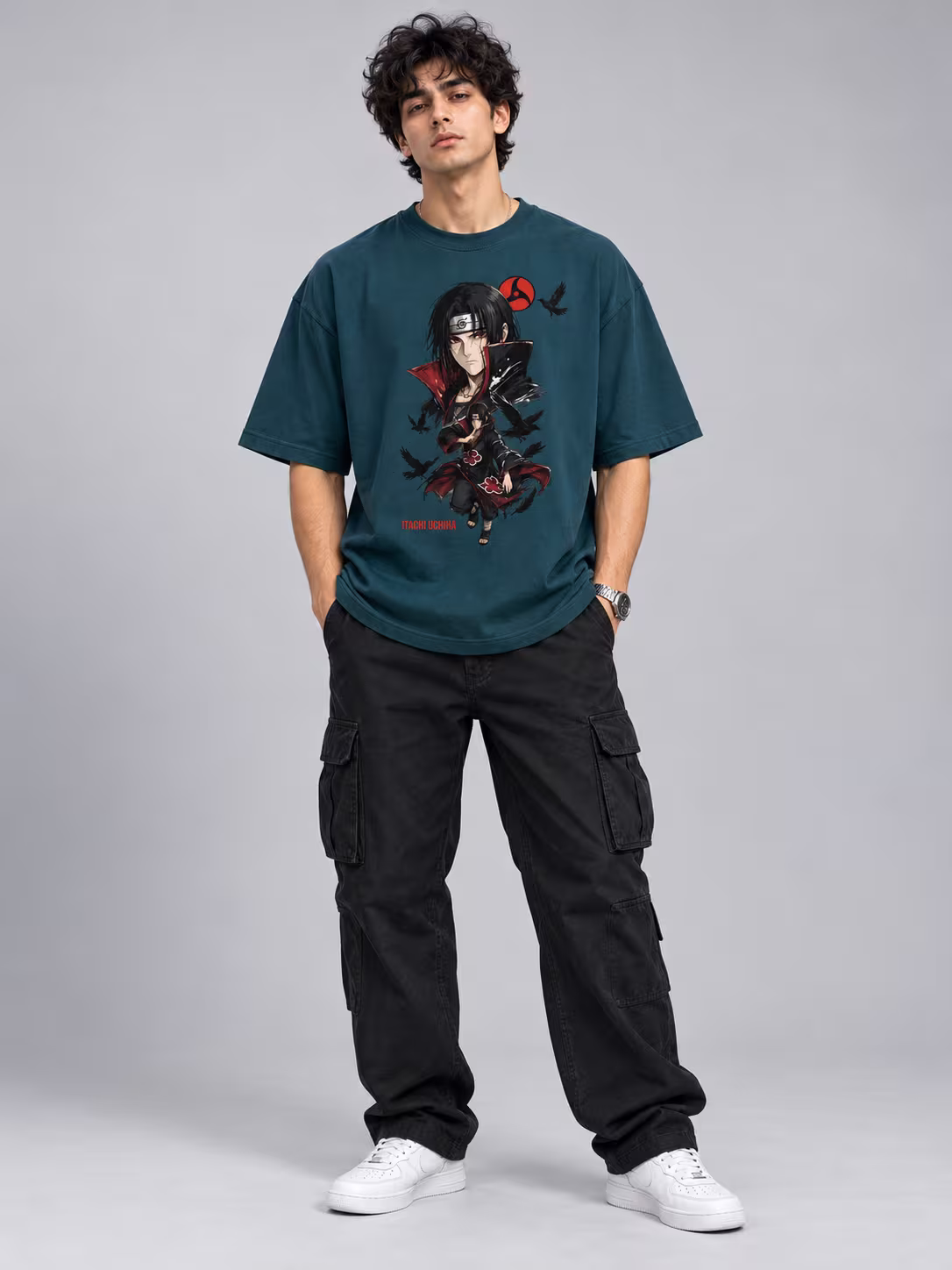 Itachi Uchiha Unisex Oversized T-Shirt in Petrol Blue, worn by a model