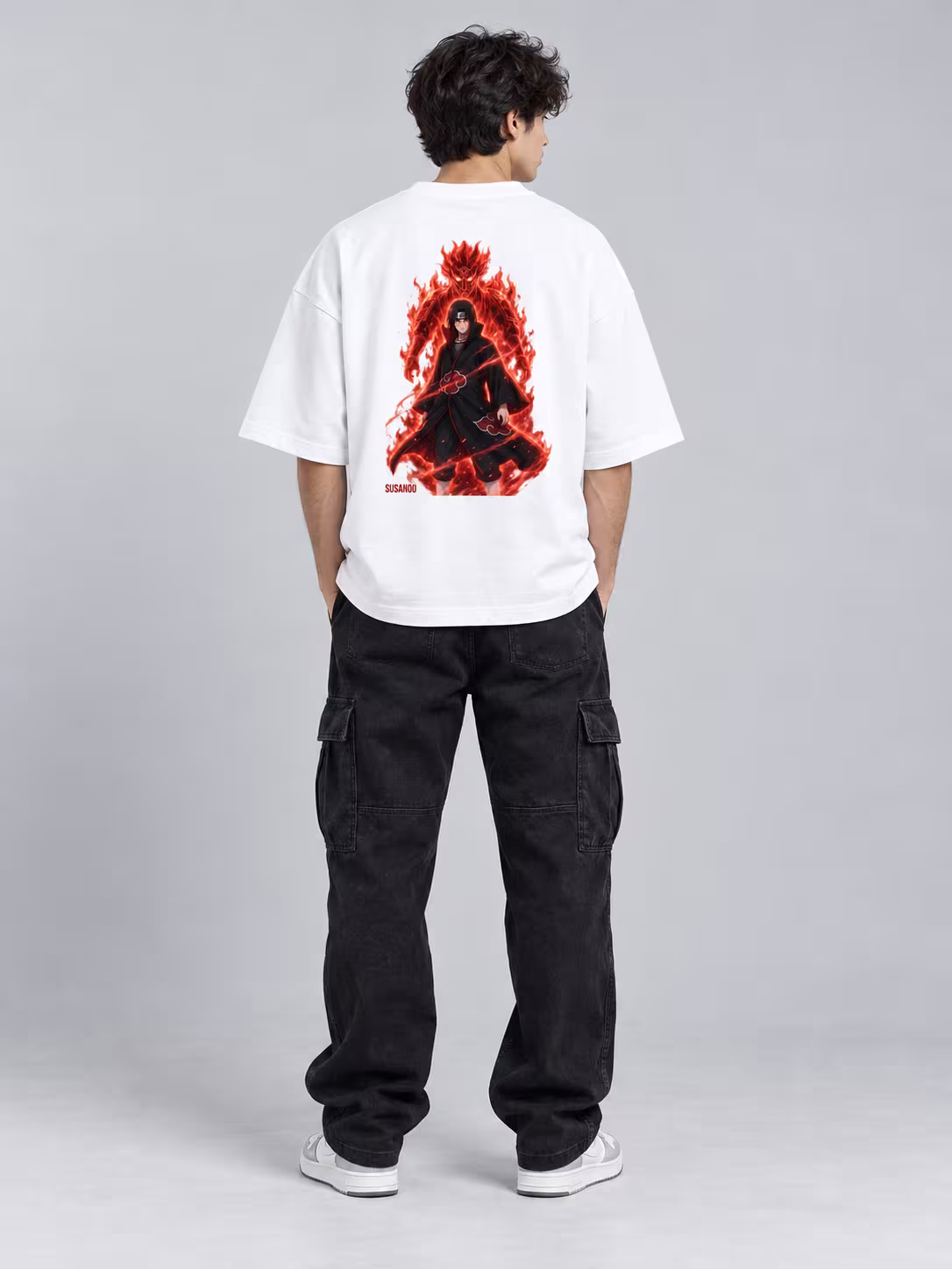 Itachi Uchiha Unisex Terry Oversized Tee in White, back print, worn by a model