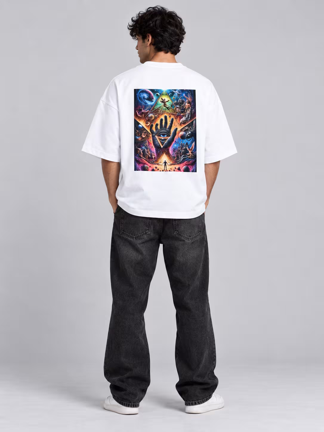 Kalyug Unisex Terry Oversized Tee in White, back print, worn by a model