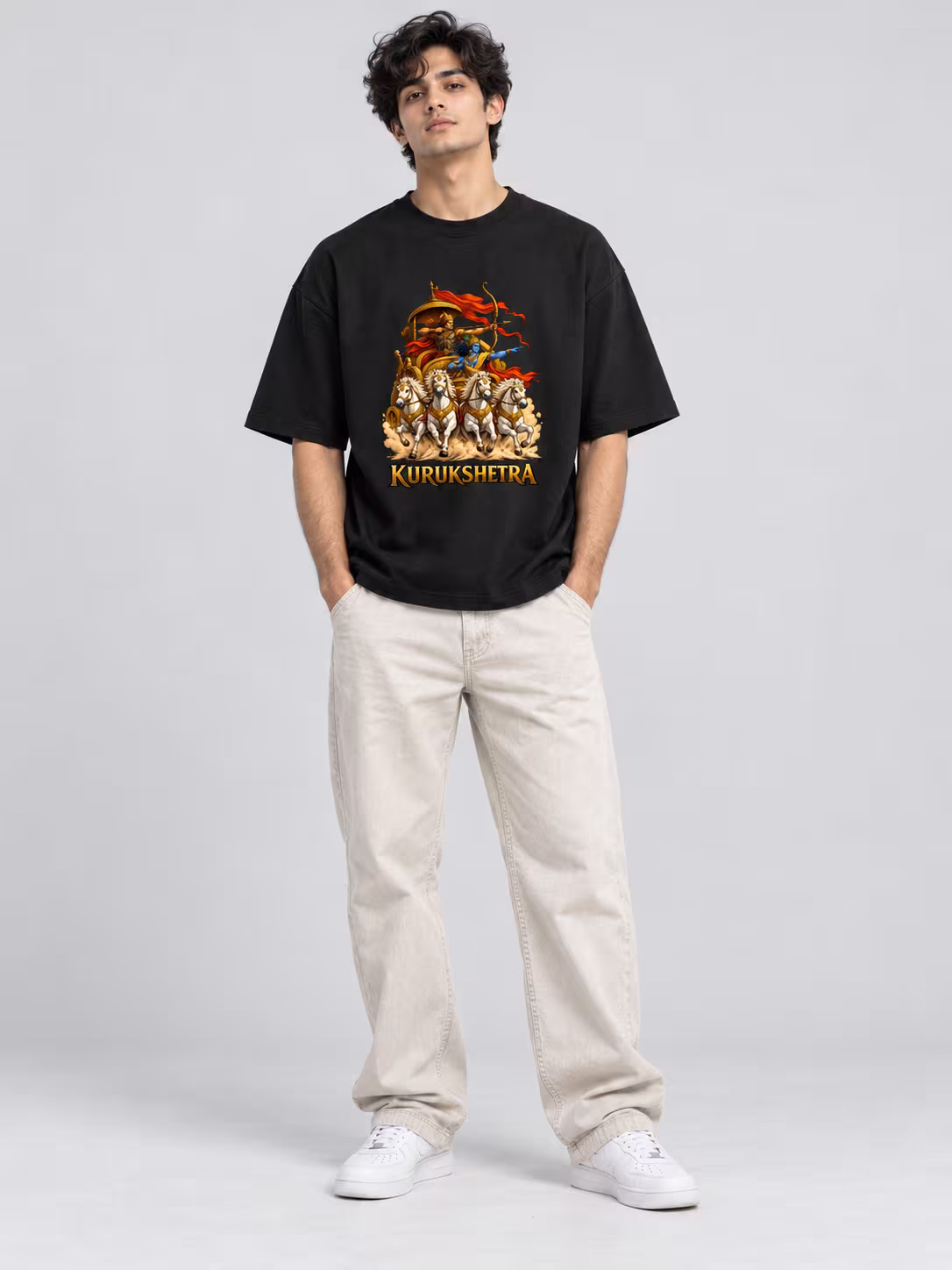 Kurukshetra Unisex Oversized T-Shirt in Black, worn by a model