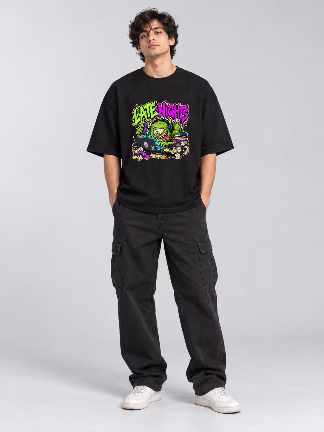 Late Nights Unisex Oversized T-Shirt in Black, worn by a model