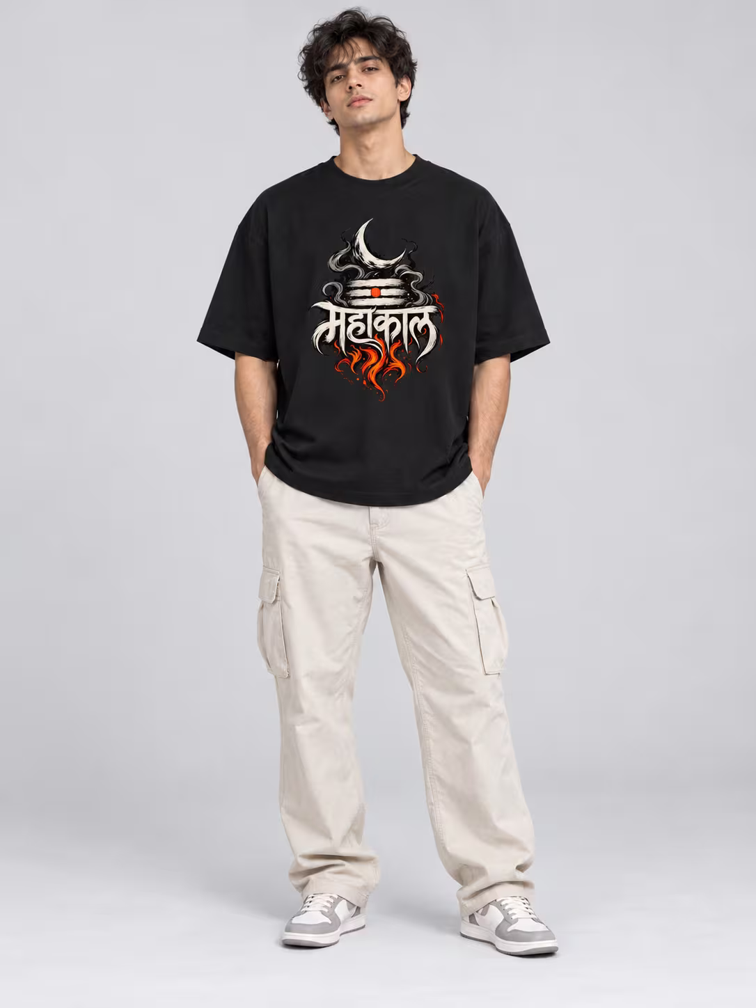 Mahakal Unisex Oversized T-Shirt in Black, worn by a model