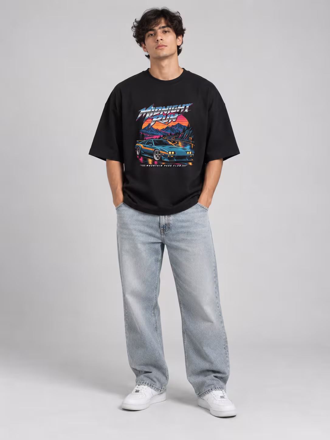 Midnight Run Unisex Terry Oversized Tee in Black, worn by a model