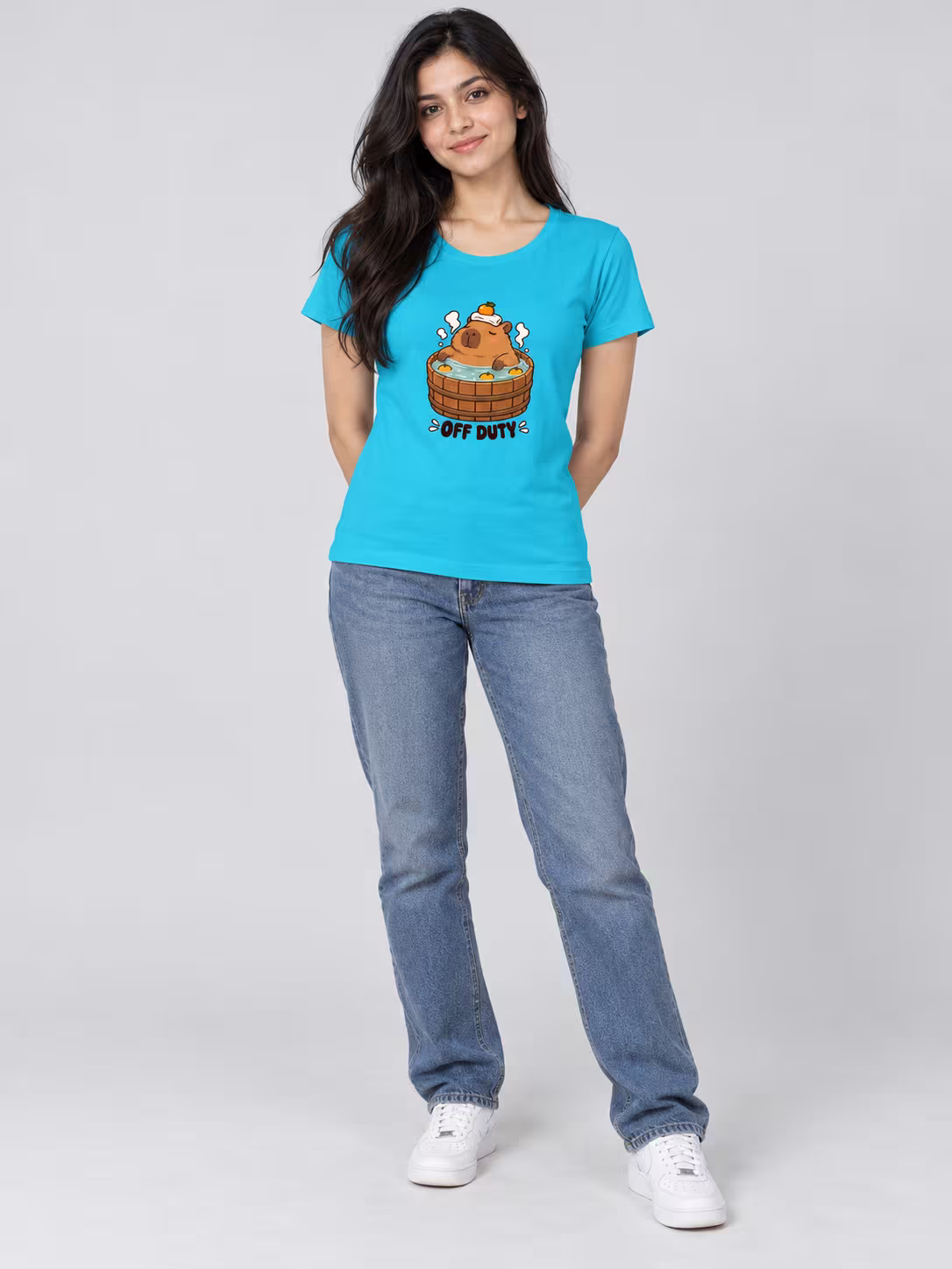 Capybara t-shirt: Off Duty Capybara Women's T-Shirt in SkyBlue, worn by a model