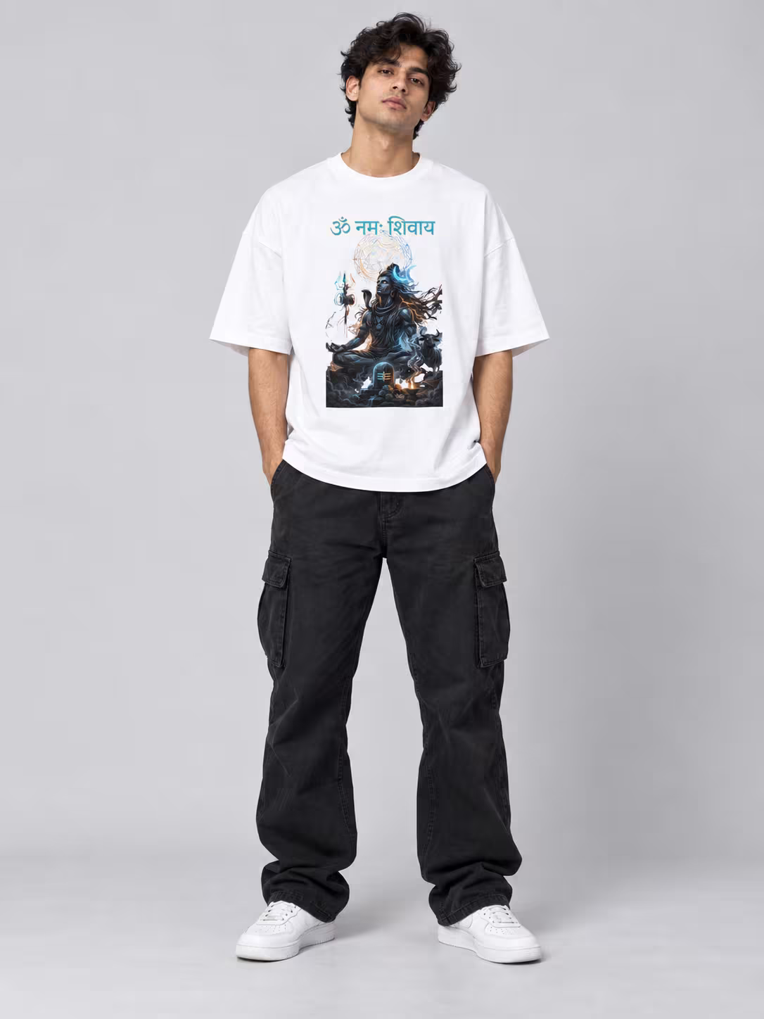 Om Namah Shivaya Unisex Oversized T-Shirt in White, worn by a model