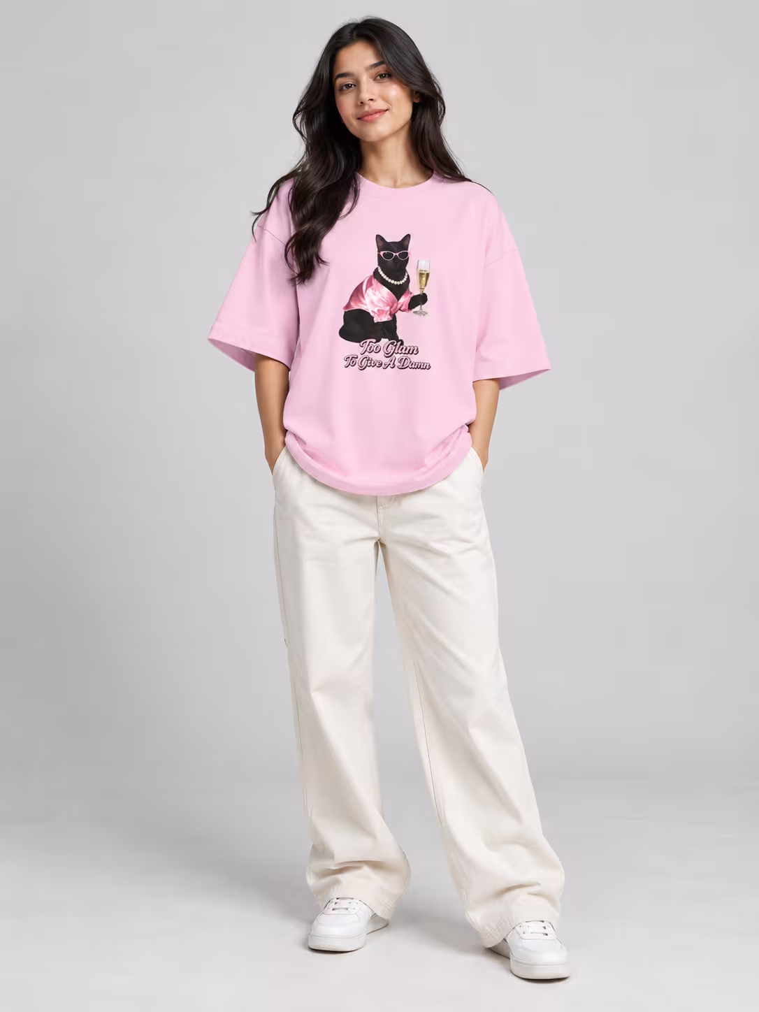 Party Cat Unisex Terry Oversized Tee in Light Baby Pink, worn by a model