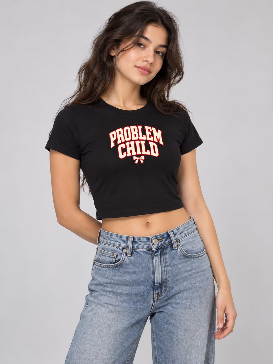 Problem Child Baby Tee in Black, worn by a model