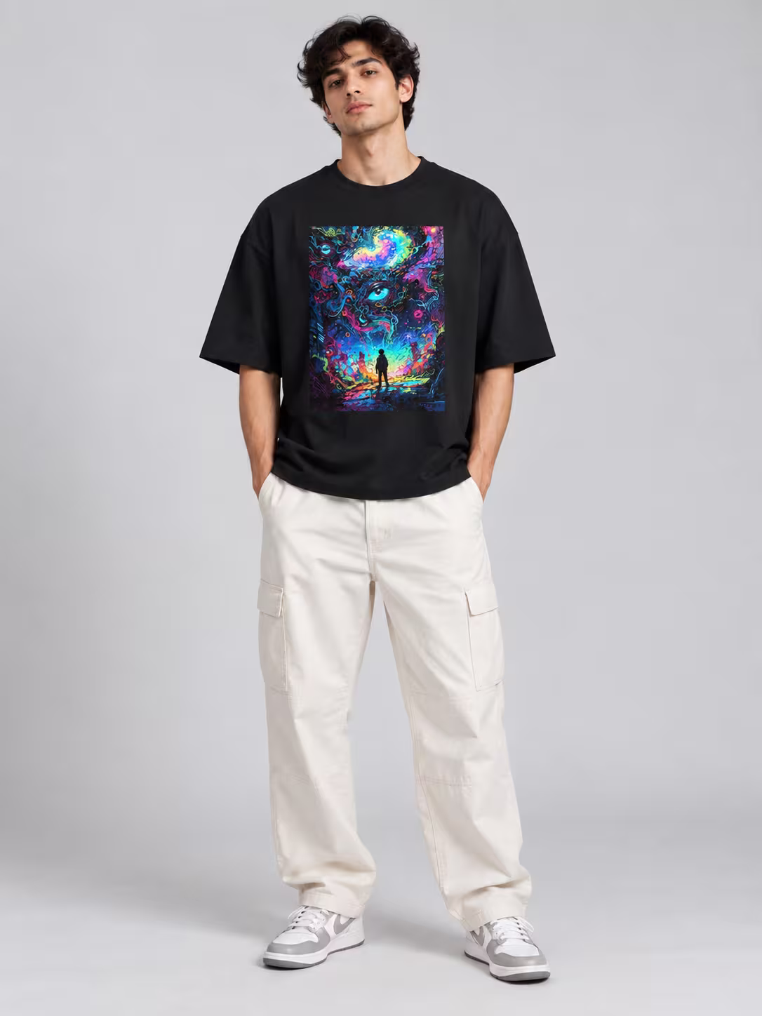 Psychedelic Art Unisex Oversized T-Shirt in Black, worn by a model