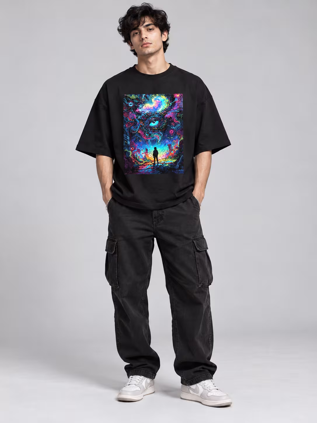 Psychedelic Art Unisex Terry Oversized Tee in Black, worn by a model
