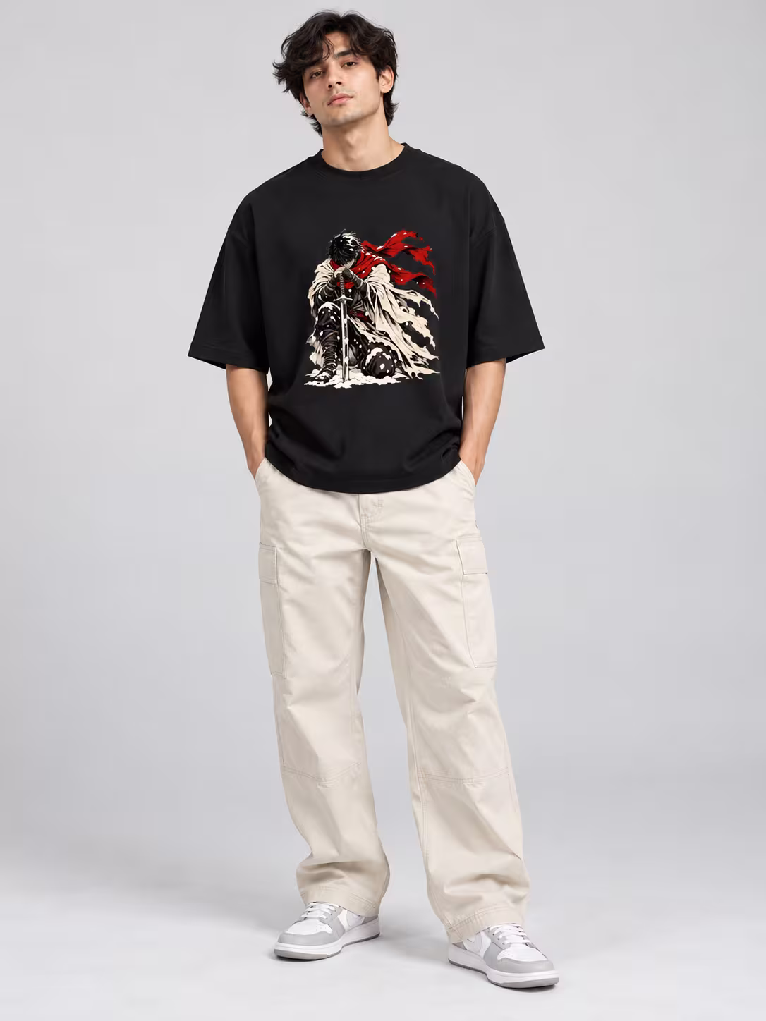 Red Scarf Unisex Oversized T-Shirt in Black, worn by a model