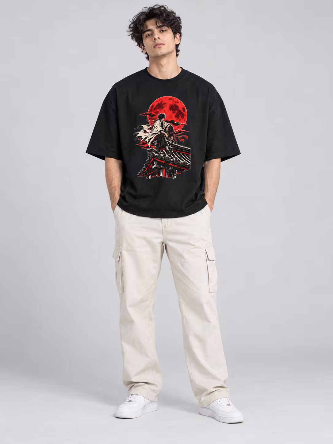 Rooftop Watch Unisex Oversized T-Shirt in Black, worn by a model