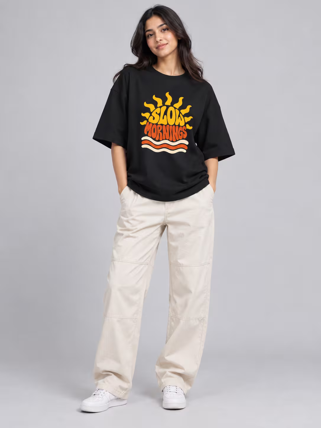 Slow Mornings Unisex Terry Oversized Tee in Black, worn by a model