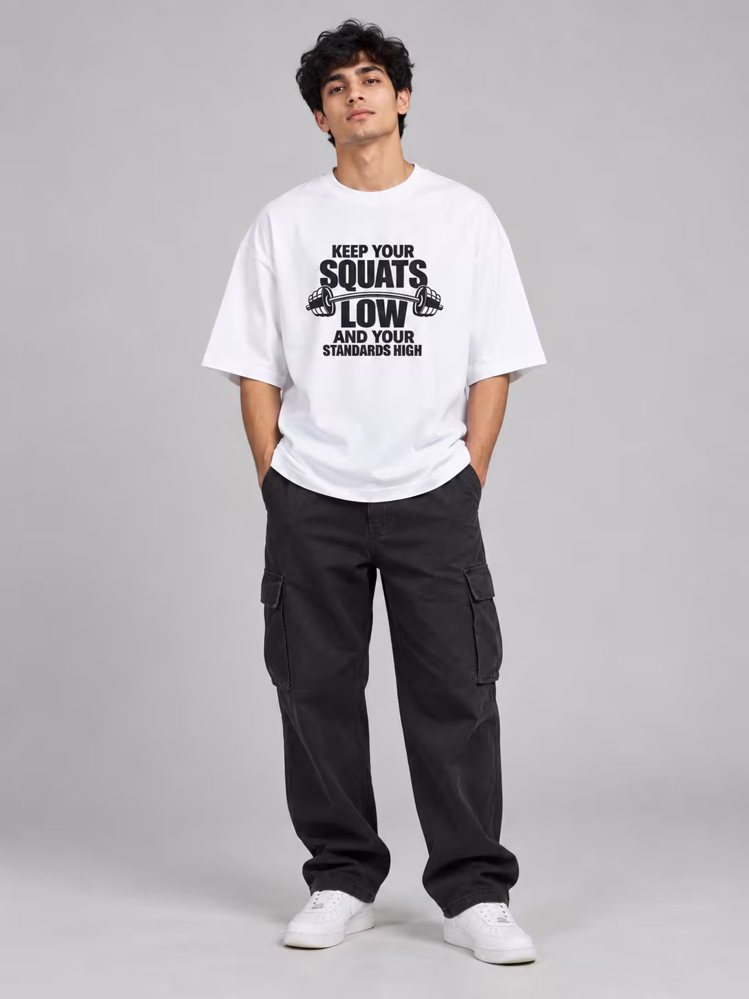 Squats Low Standard High White Unisex Oversized T-Shirt in White, worn by a model