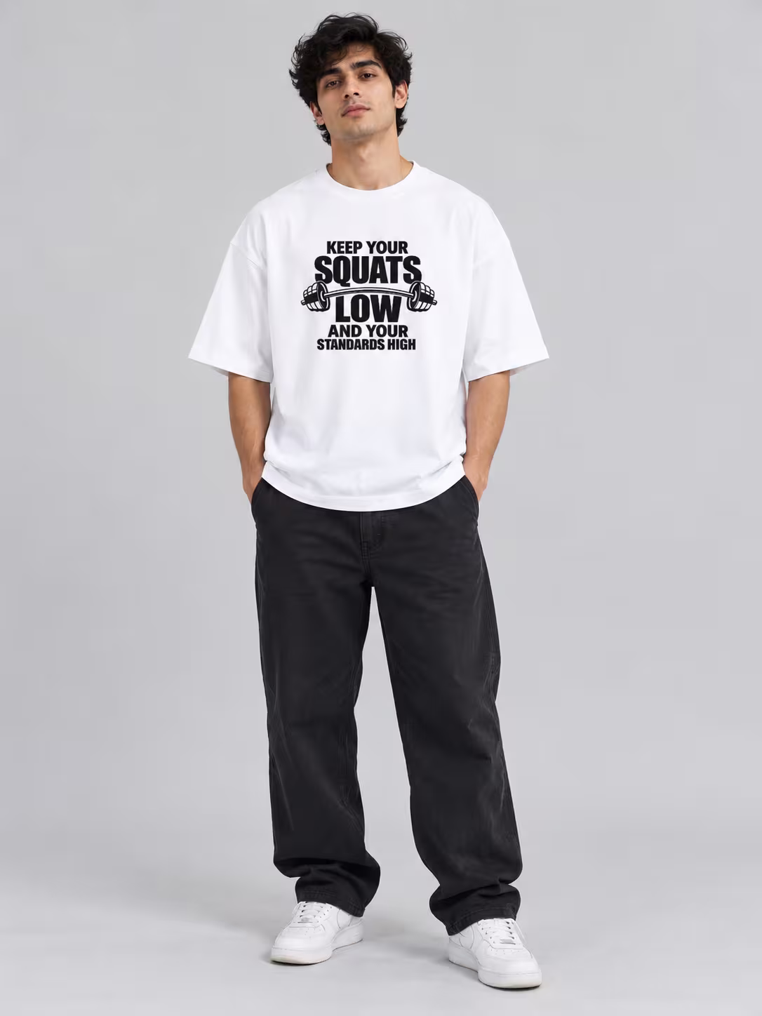 Squats Low Standard High White Unisex Terry Oversized Tee in White, worn by a model