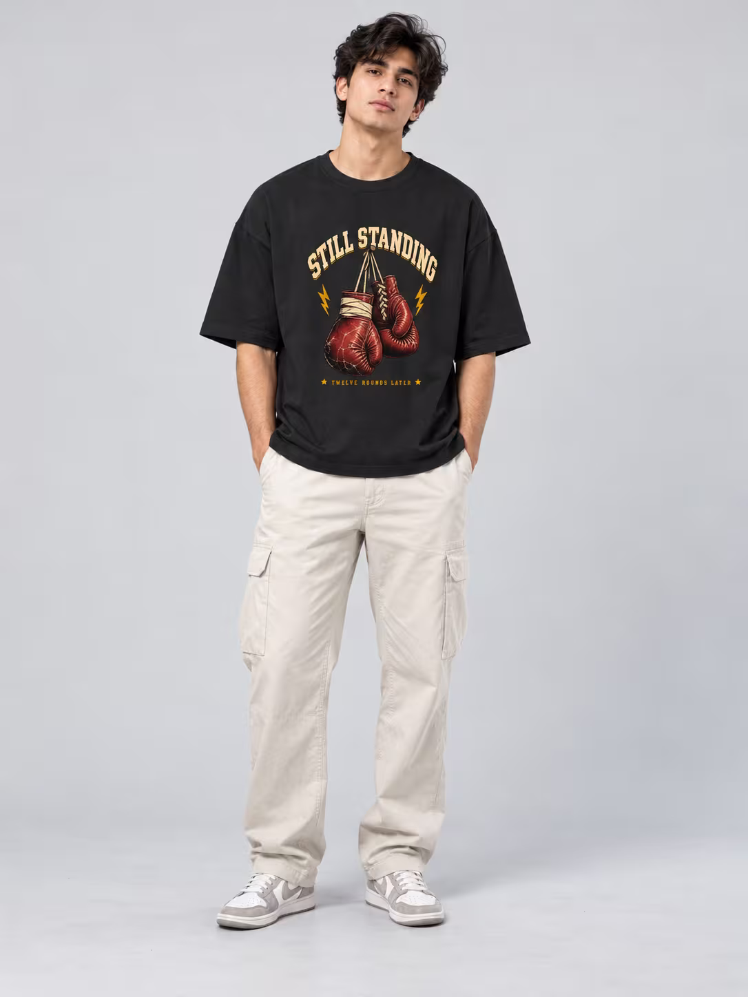 Still Standing Unisex Oversized T-Shirt in Black, front