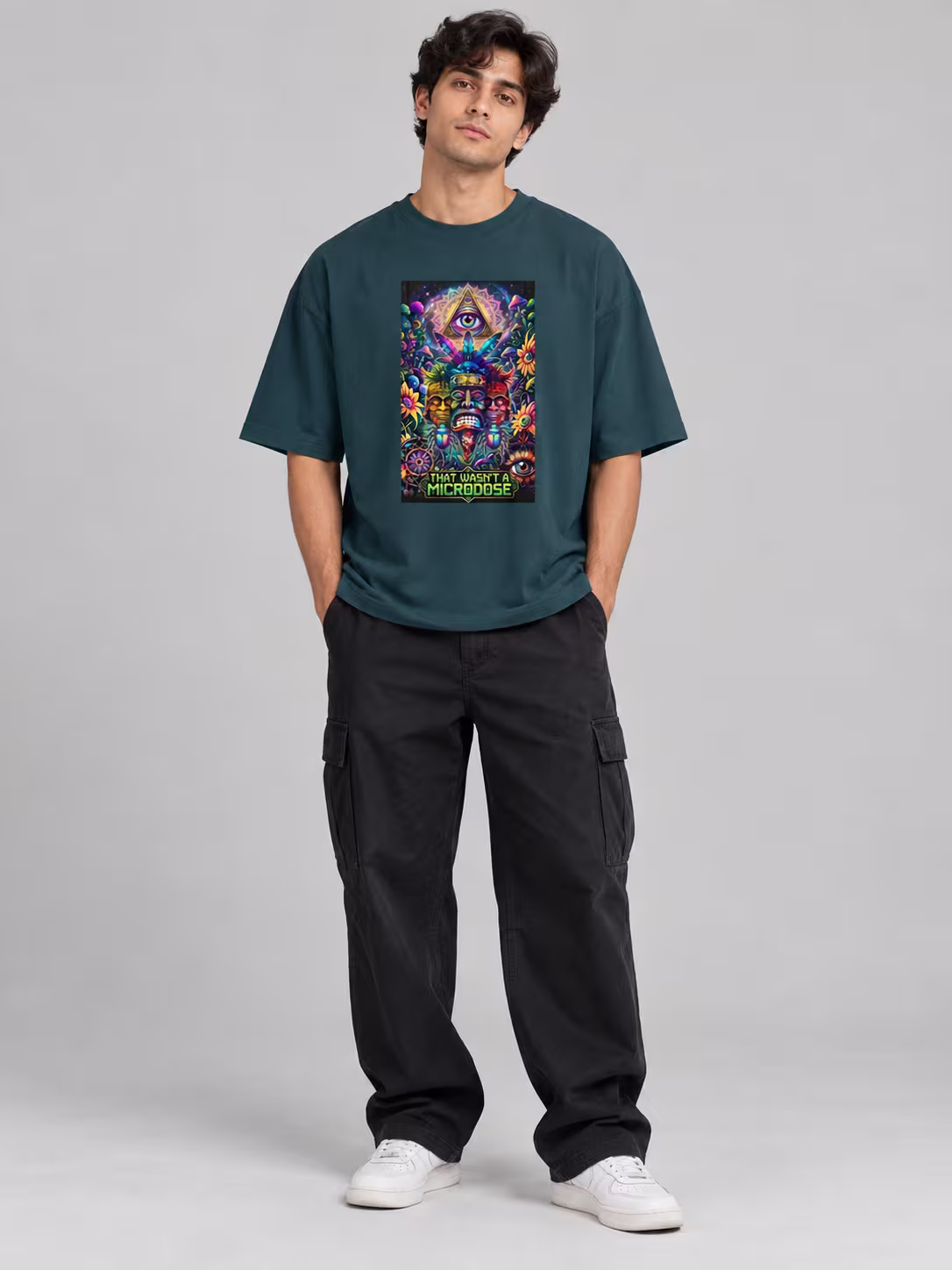 That Wasn't A Microdose Unisex Oversized T-Shirt in Petrol Blue, worn by a model