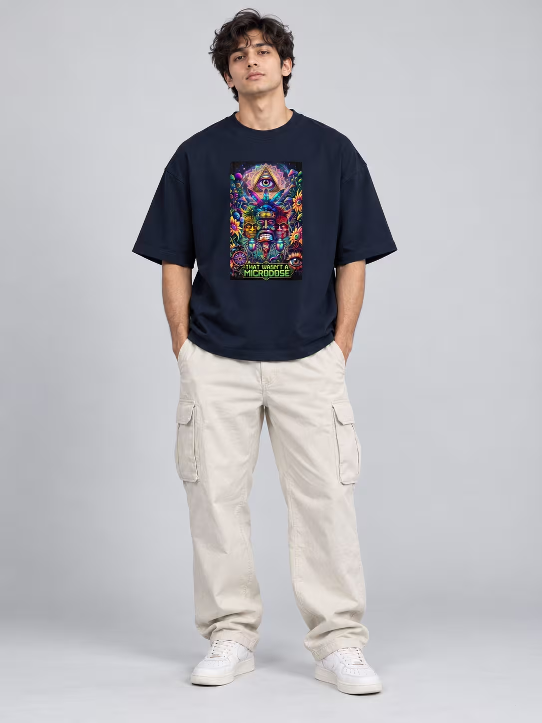That Wasn't A Microdose Unisex Terry Oversized Tee in Navy Blue, worn by a model