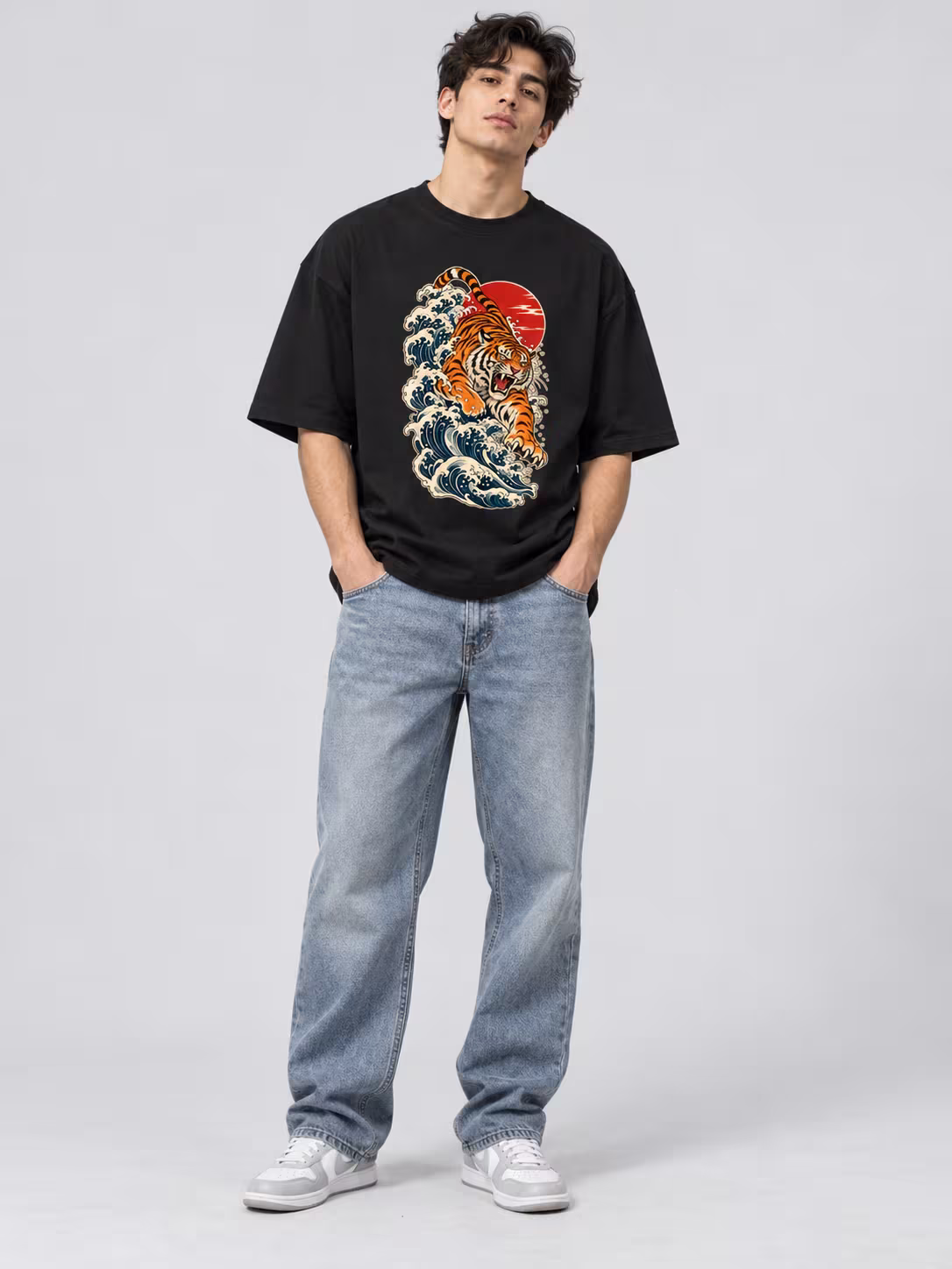 Tiger t-shirt: Tiger Wave Unisex Oversized T-Shirt in Black, worn by a model