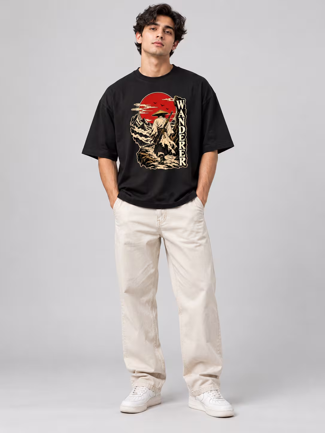 Samurai t-shirt: Wanderer Samurai Unisex Oversized T-Shirt in Black, worn by a model