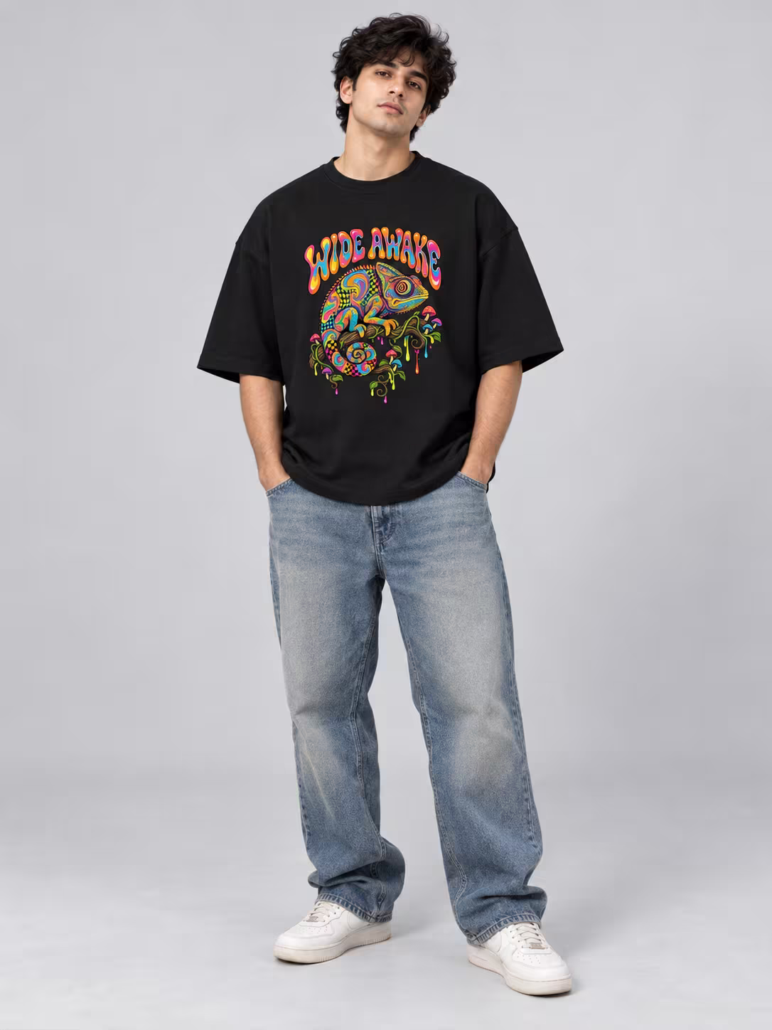 Wide Awake Unisex Terry Oversized Tee in Black, worn by a model