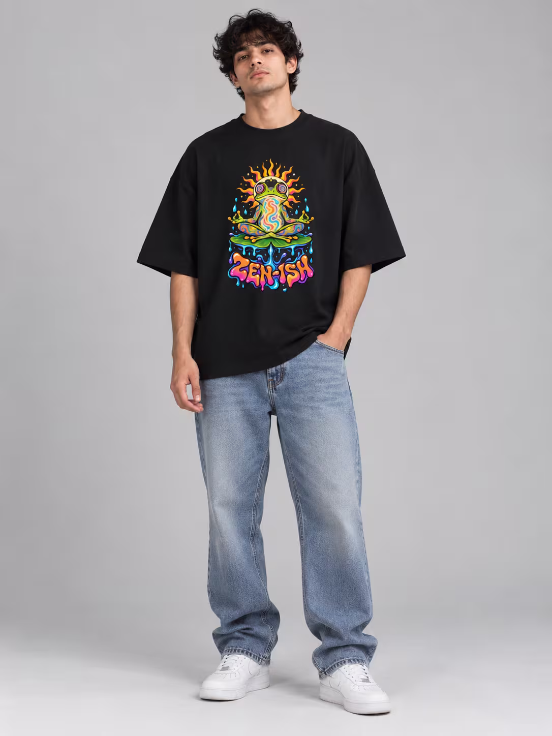 Zen-ish Unisex Terry Oversized Tee in Black, worn by a model