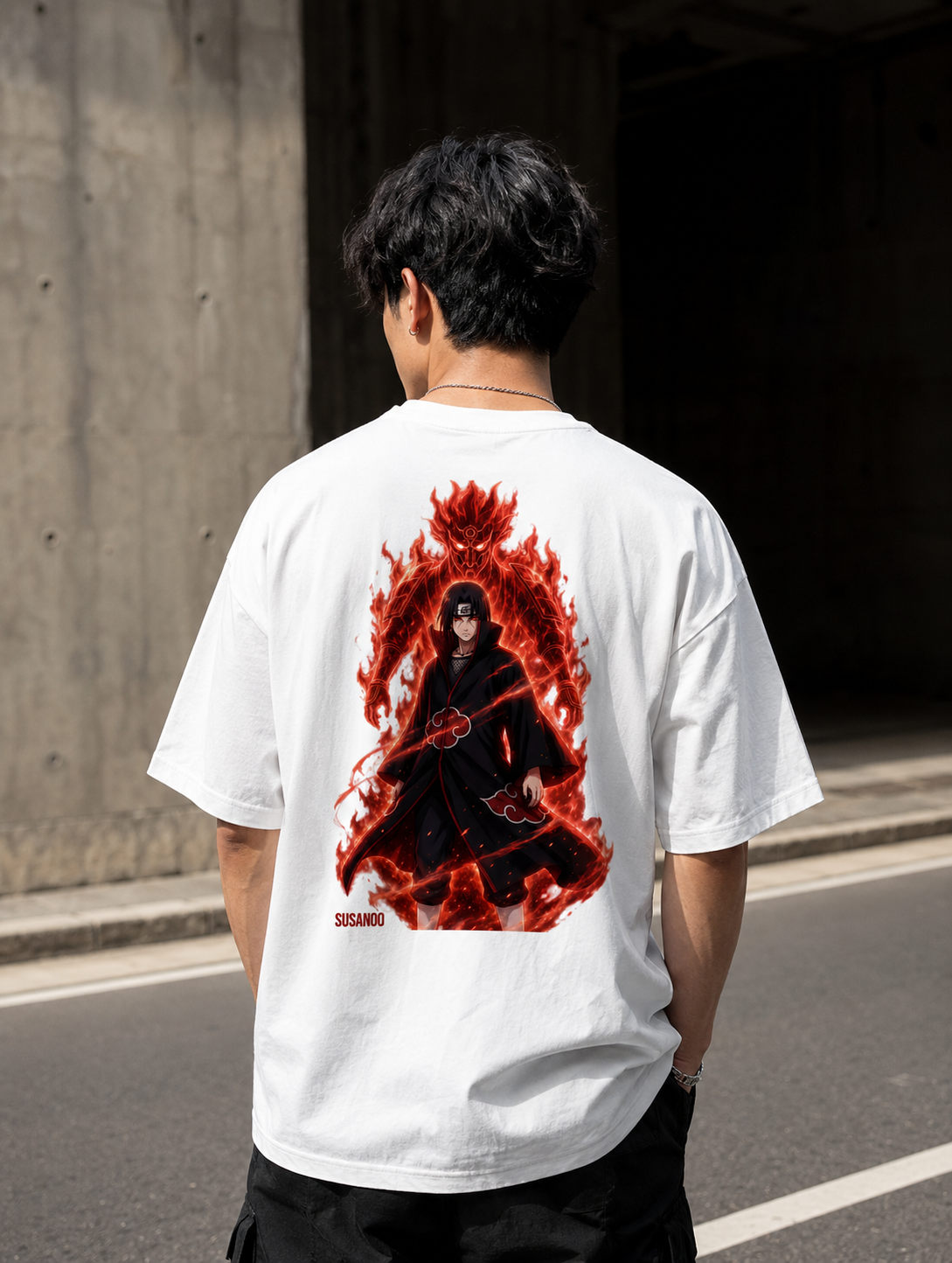 Trendy white oversized Itachi Uchiha Naruto anime streetwear t-shirt back view featuring bold fiery Akatsuki artwork on 240 GSM premium cotton tee.