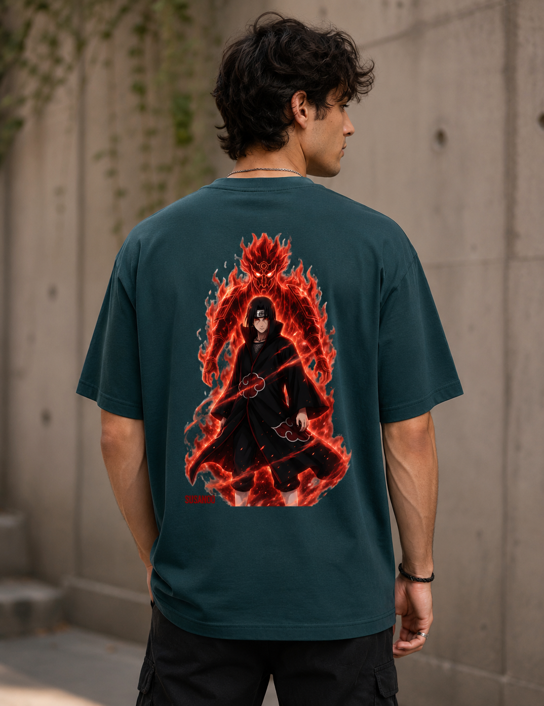 Trendy petrol blue oversized Itachi Uchiha Naruto anime streetwear t-shirt back view featuring striking fiery Akatsuki graphic on premium heavyweight cotton tee.
