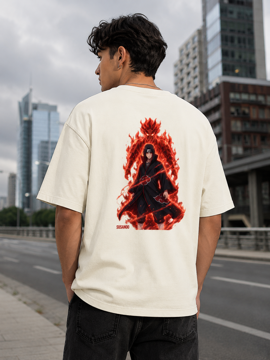 Trendy off white oversized Itachi Uchiha Naruto anime streetwear t-shirt back view with large Akatsuki inspired graphic on heavyweight 240 GSM cotton.