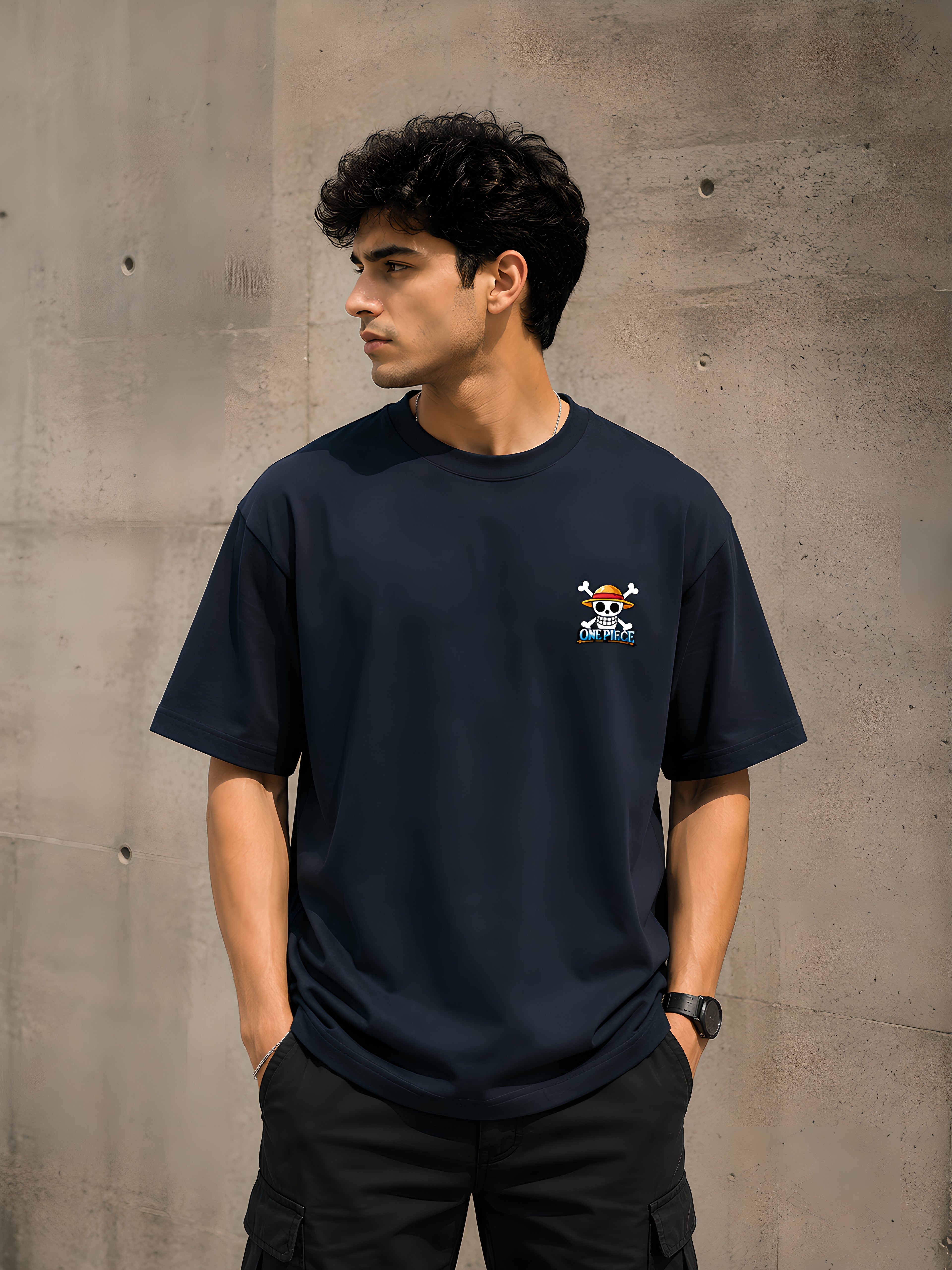 Front view of One Piece Gear 5 Luffy off blue anime t-shirt featuring Straw Hat Pirates skull logo on the left chest pocket print.